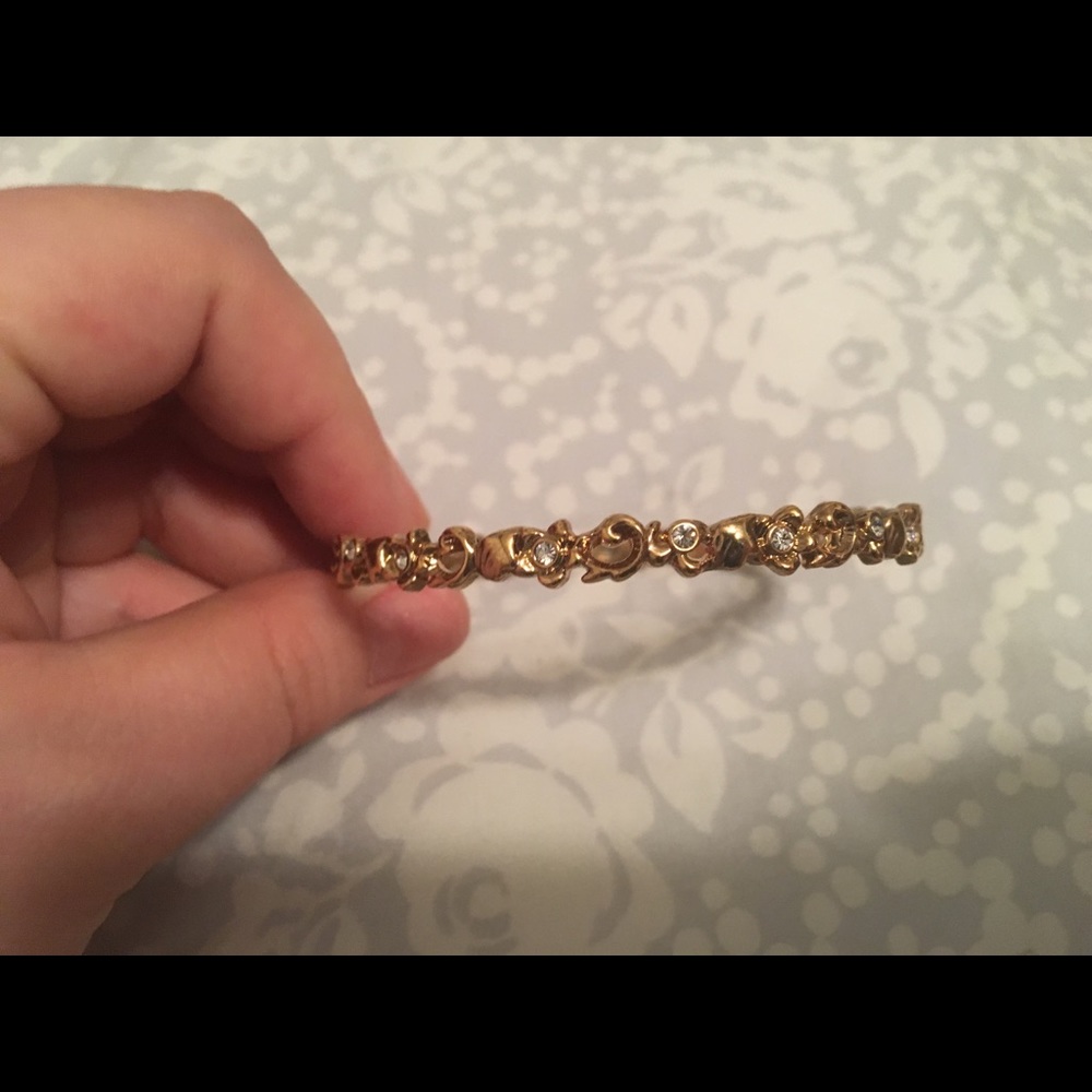 Gold bangle with crystals